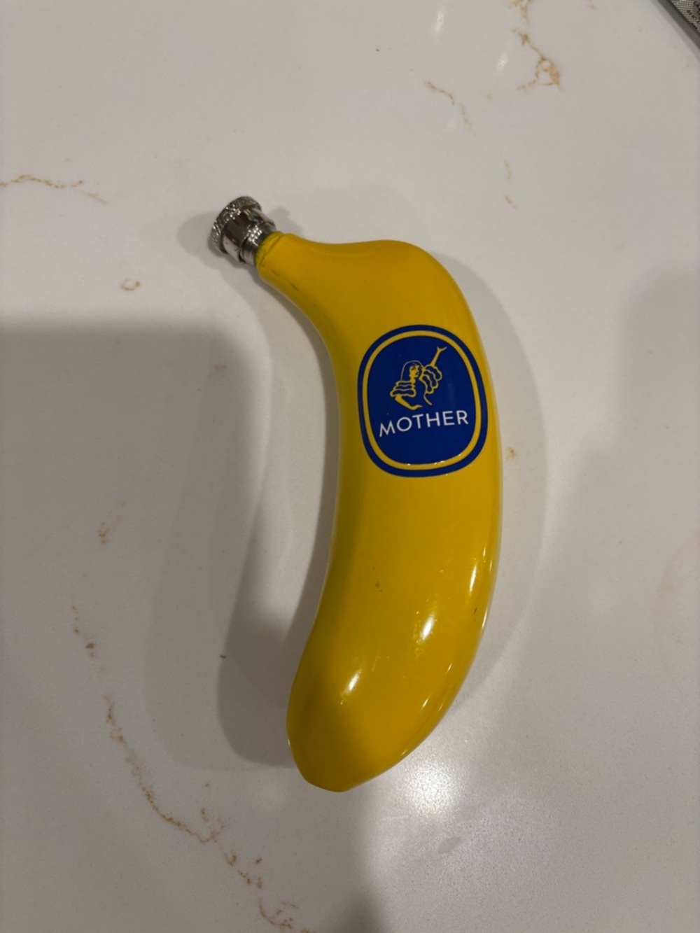 MOTHER Yellow Banana-Shaped Flask with Blue Logo